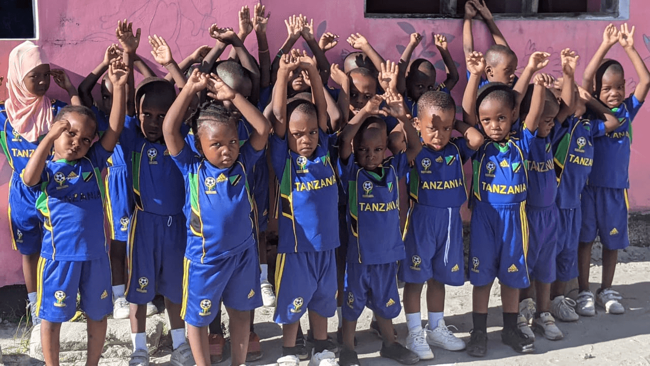 Amosi Schools students gathered outdoors